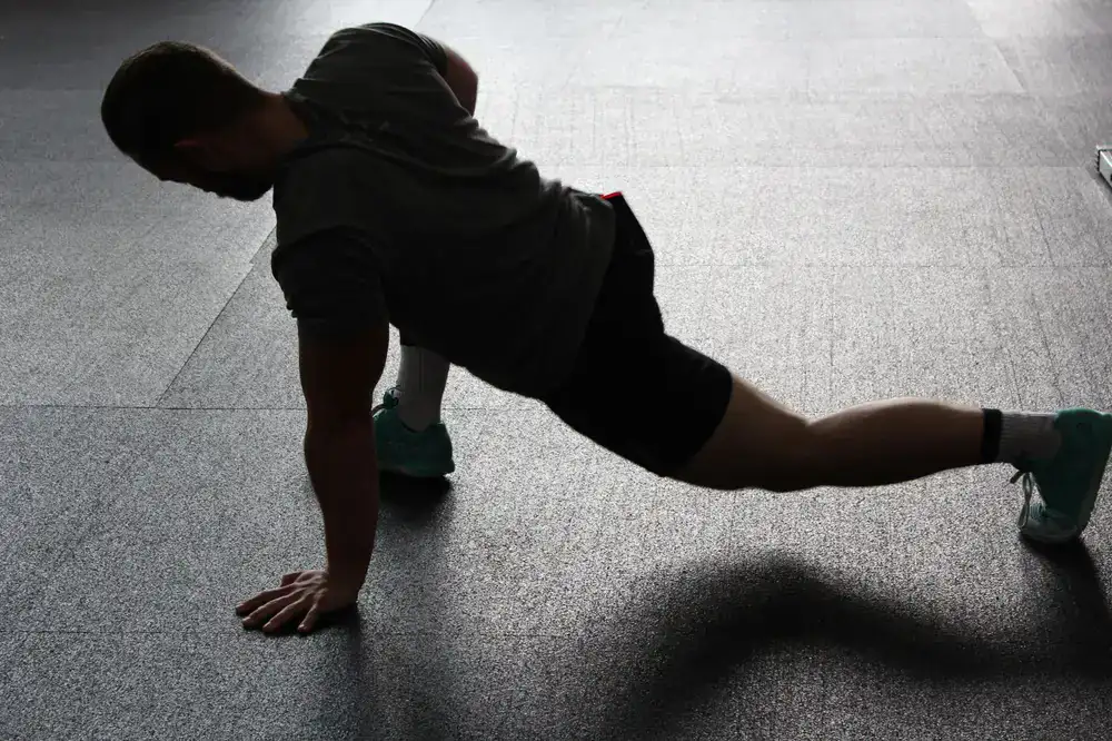 Athlete stretching muscles